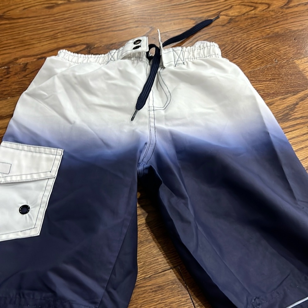blue and white swim shorts